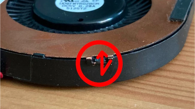 a diagram showing the metal flap that needs to be bent to open the fan